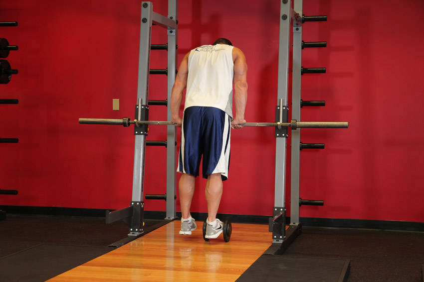 How to perform the Calf Raise On A Dumbbell exercise