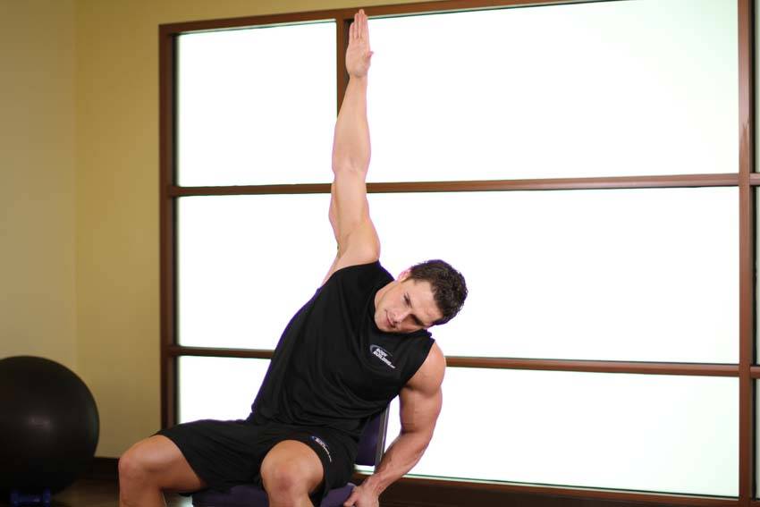 How to perform the Chair Lower Back Stretch exercise