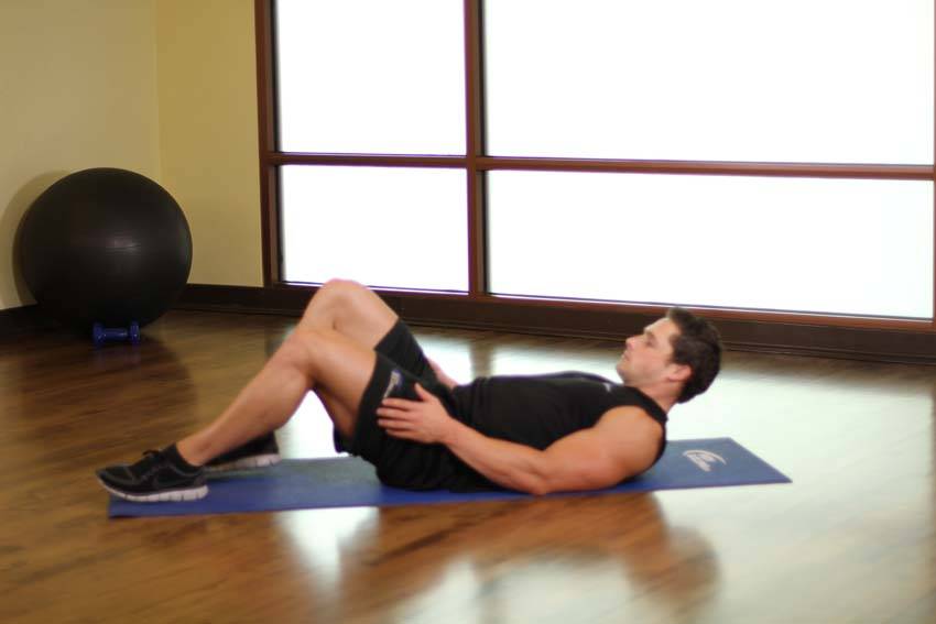 How to perform the Ankle On The Knee exercise