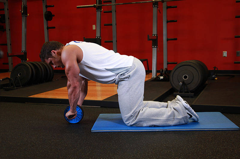 How to perform the Ab Roller exercise