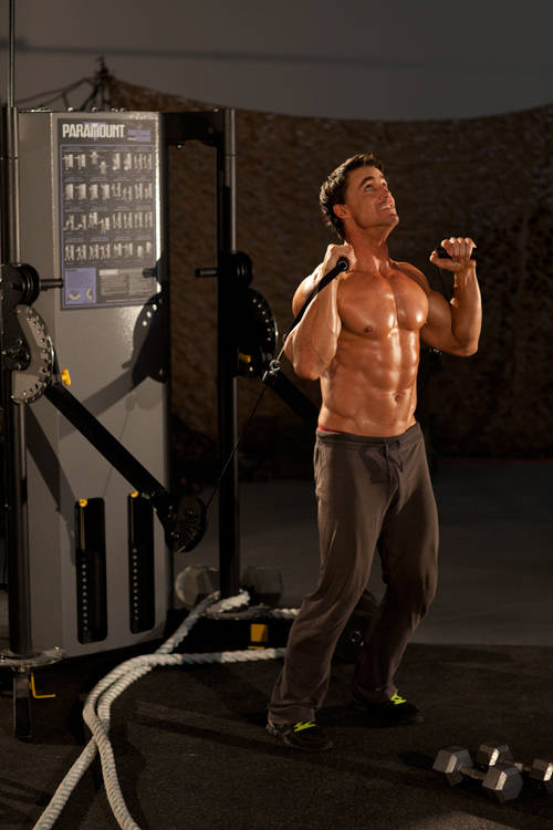 How to perform the Alternating Cable Shoulder Press exercise