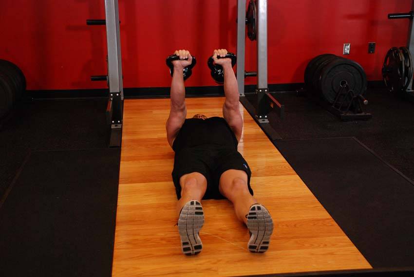 How to perform the Alternating Floor Press exercise