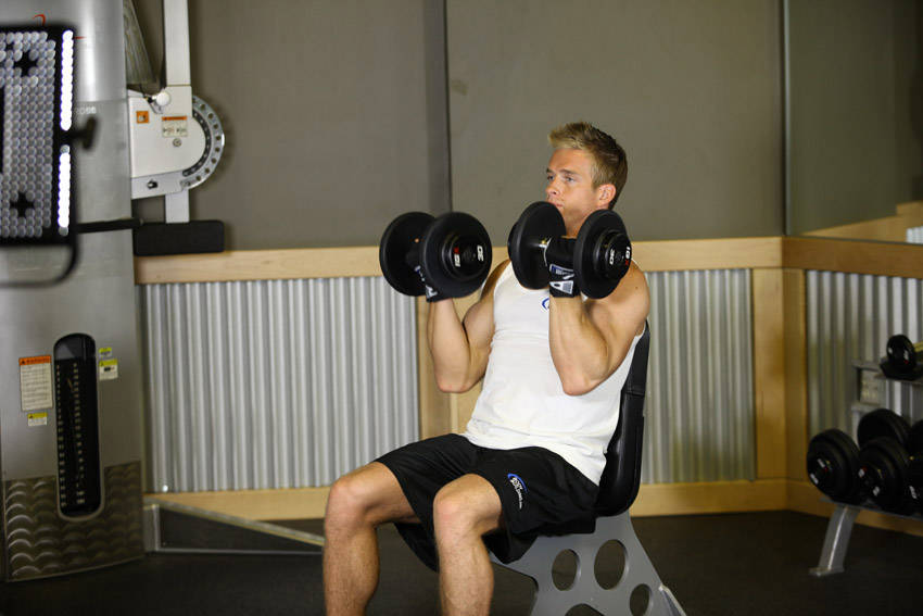 How to perform the Arnold Dumbbell Press exercise