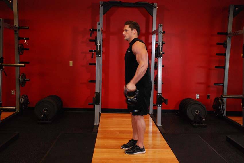 How to perform the Bottoms-Up Clean From The Hang Position exercise