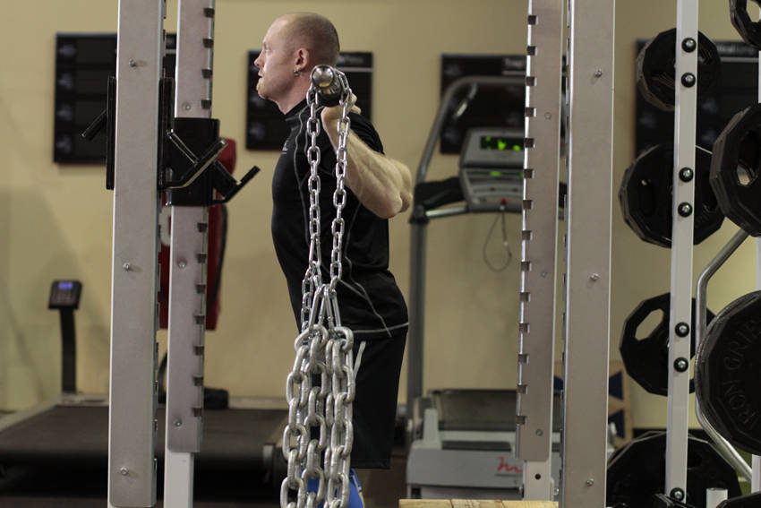 How to perform the Box Squat with Chains exercise