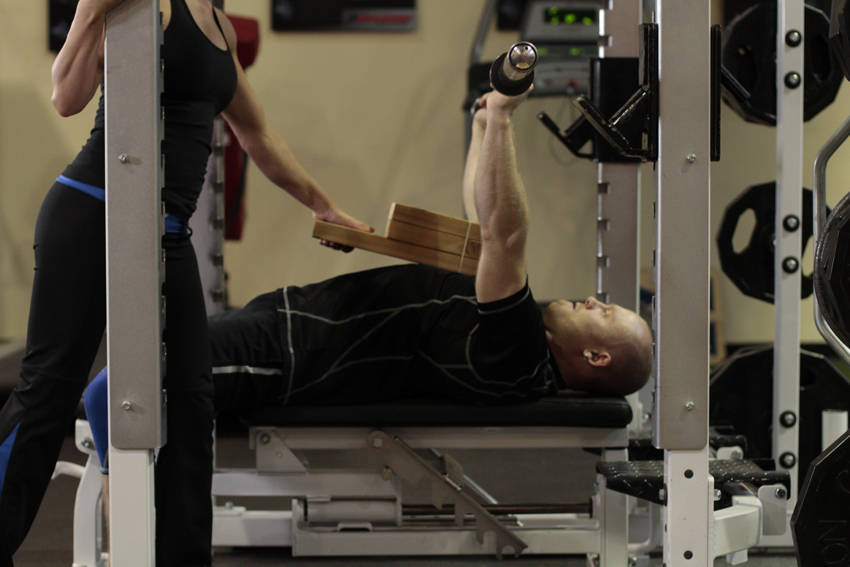 How to perform the Board Press exercise