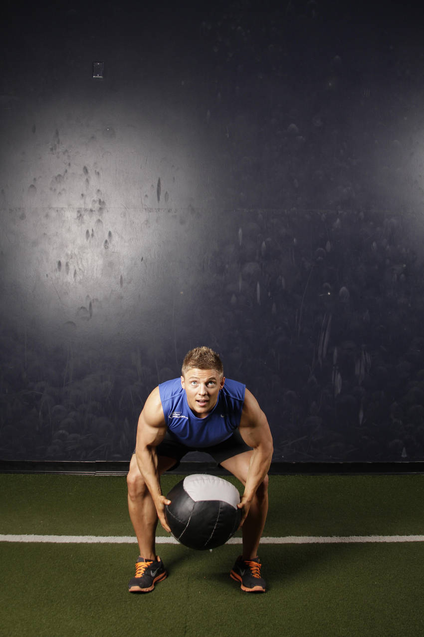 How to perform the Backward Medicine Ball Throw exercise