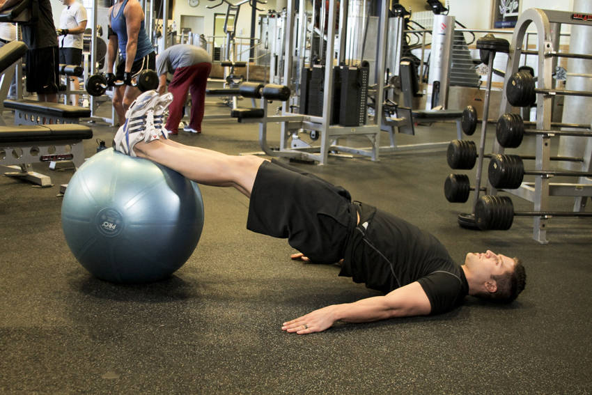 How to perform the Ball Leg Curl exercise