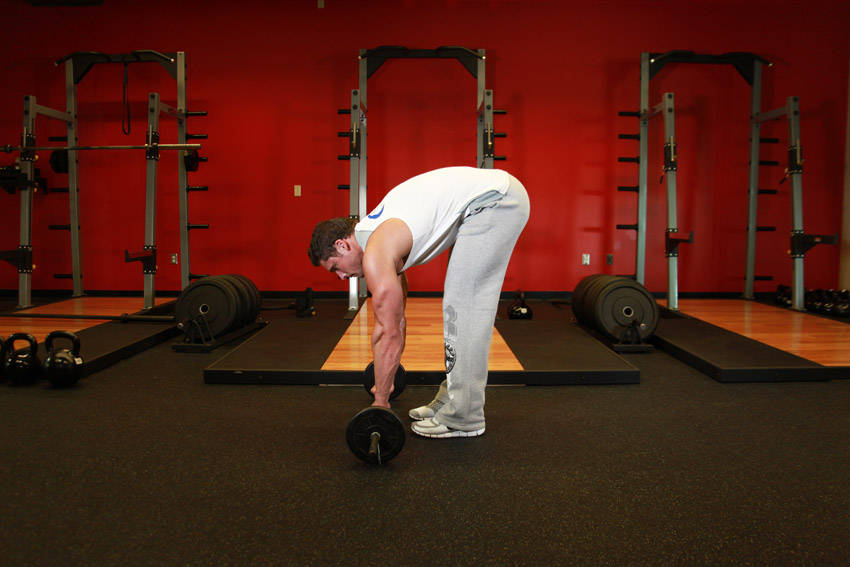 How to perform the Barbell Ab Rollout exercise