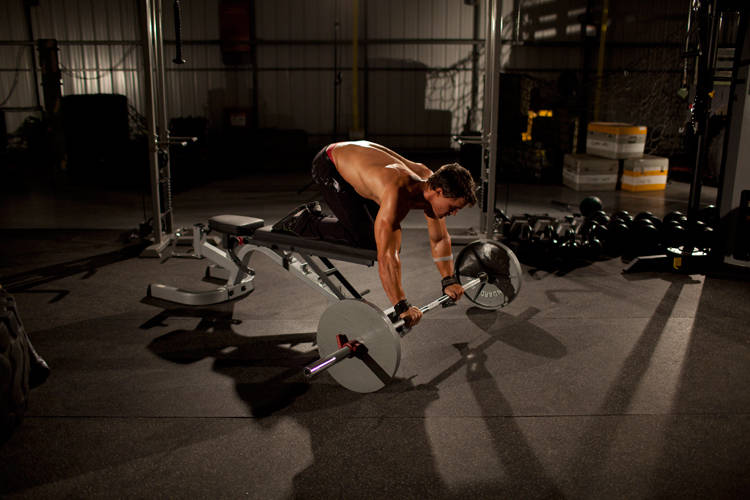 How to perform the Barbell Rollout from Bench exercise