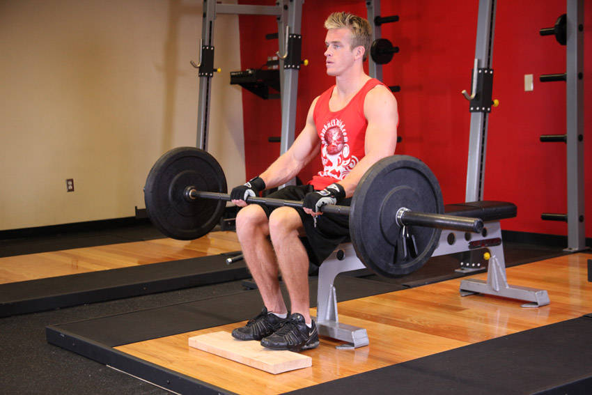 How to perform the Barbell Seated Calf Raise exercise