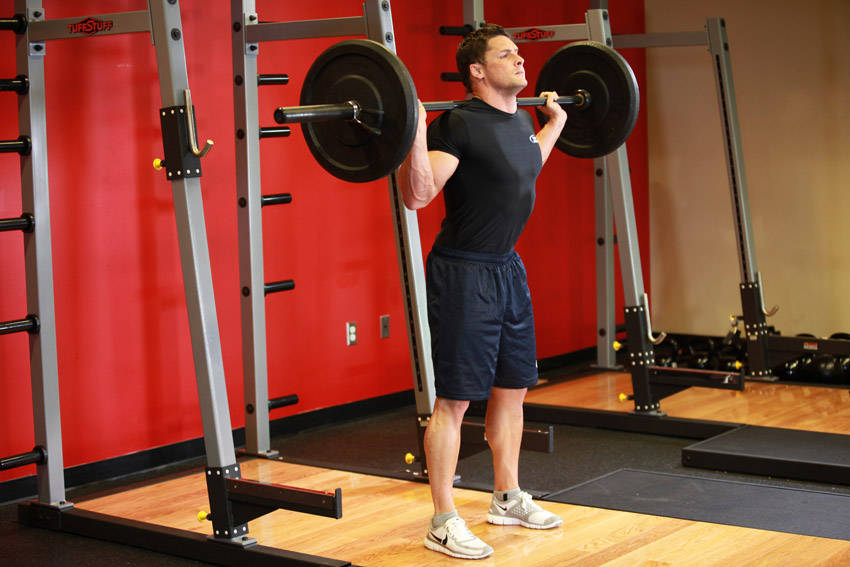 How to perform the Barbell Squat exercise