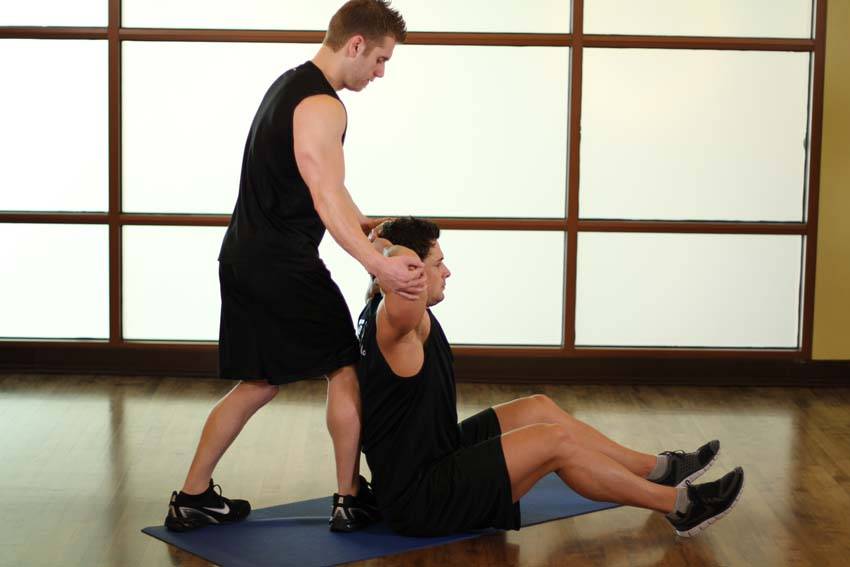 How to perform the Behind Head Chest Stretch exercise
