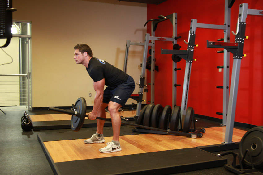How to perform the Bent Over One-Arm Long Bar Row exercise