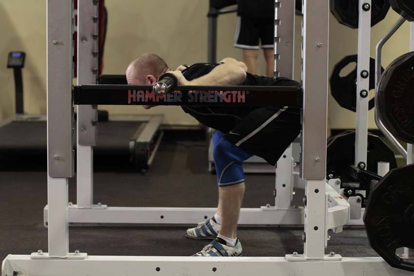 How to perform the Good Morning off Pins exercise