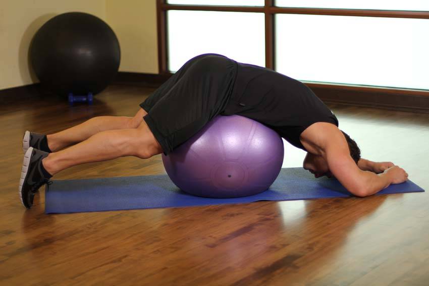 How to perform the Downward Facing Balance exercise