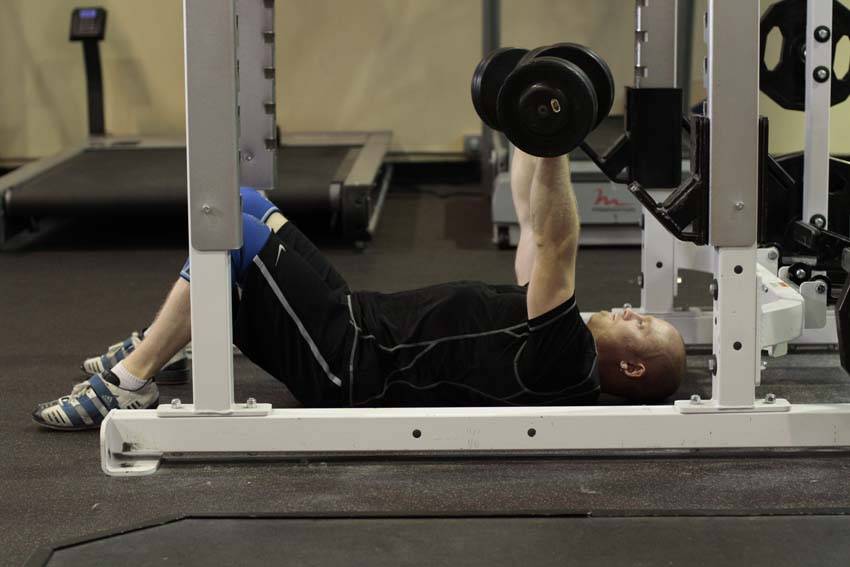 How to perform the Dumbbell Floor Press exercise