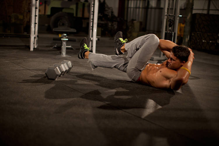 How to perform the Elbow to Knee exercise