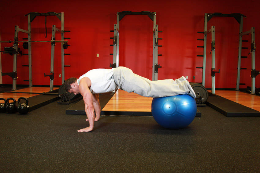 How to perform the Exercise Ball Pull-In exercise