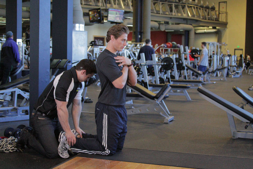 How to perform the Floor Glute-Ham Raise exercise