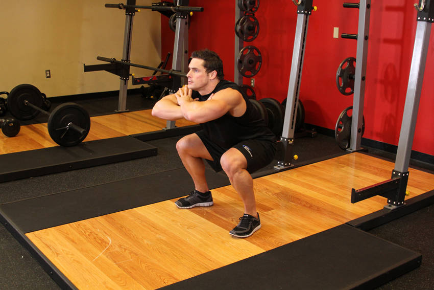 How to perform the Freehand Jump Squat exercise