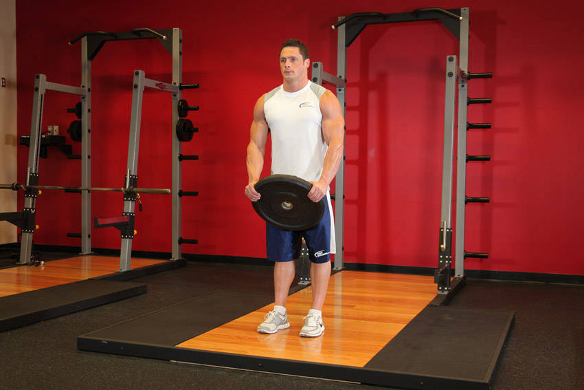 How to perform the Front Plate Raise exercise