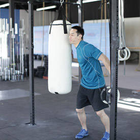 How to perform the Heavy Bag Thrust exercise