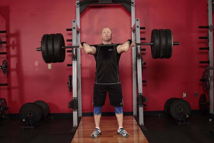 How to perform the Jerk Dip Squat exercise