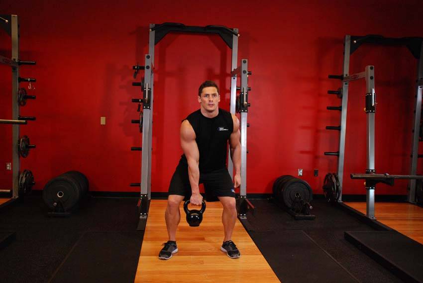 How to perform the One-Arm Kettlebell Clean and Jerk exercise