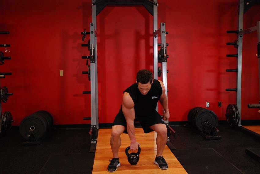 How to perform the One-Arm Open Palm Kettlebell Clean exercise