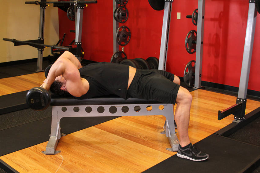 How to perform the Lying Close-Grip Barbell Triceps Extension Behind The Head exercise
