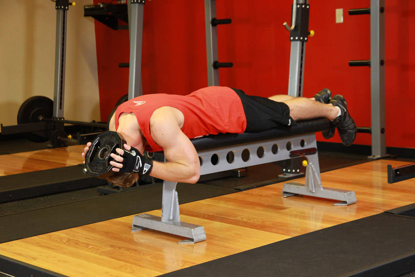 How to perform the Lying Face Down Plate Neck Resistance exercise