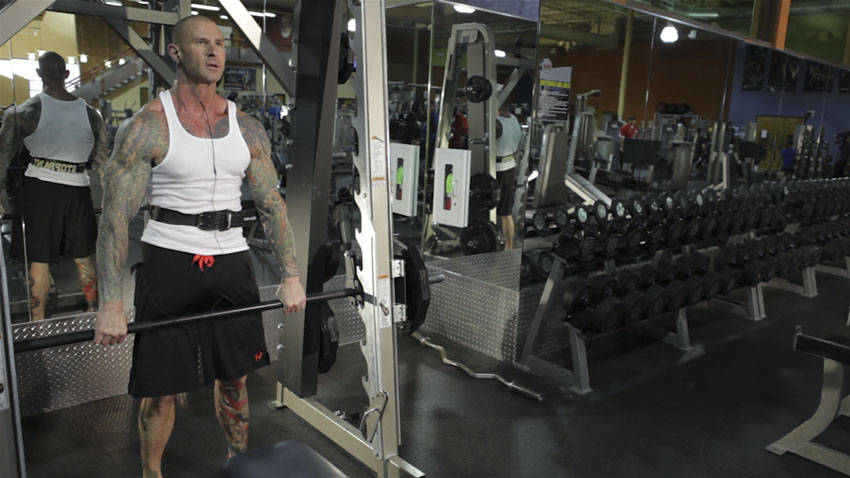 How to perform the Smith Machine Hang Power Clean exercise