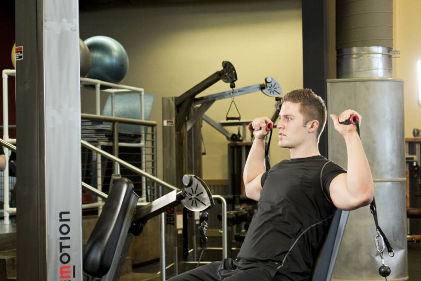 How to perform the Seated Cable Shoulder Press exercise