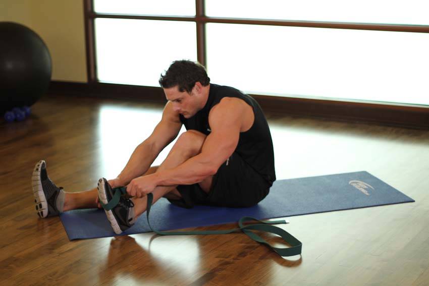 How to perform the Seated Hamstring and Calf Stretch exercise