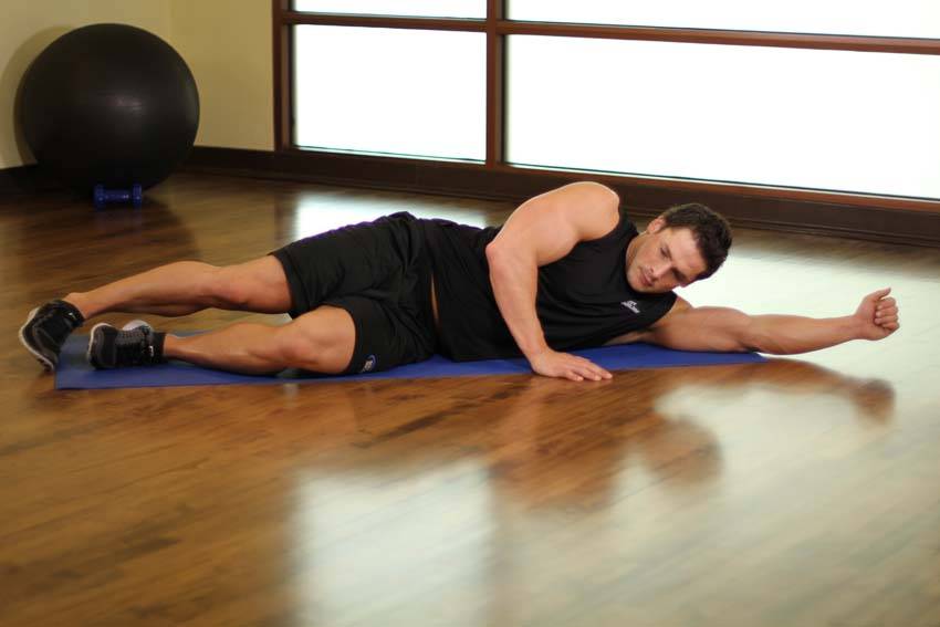 How to perform the Side-Lying Floor Stretch exercise