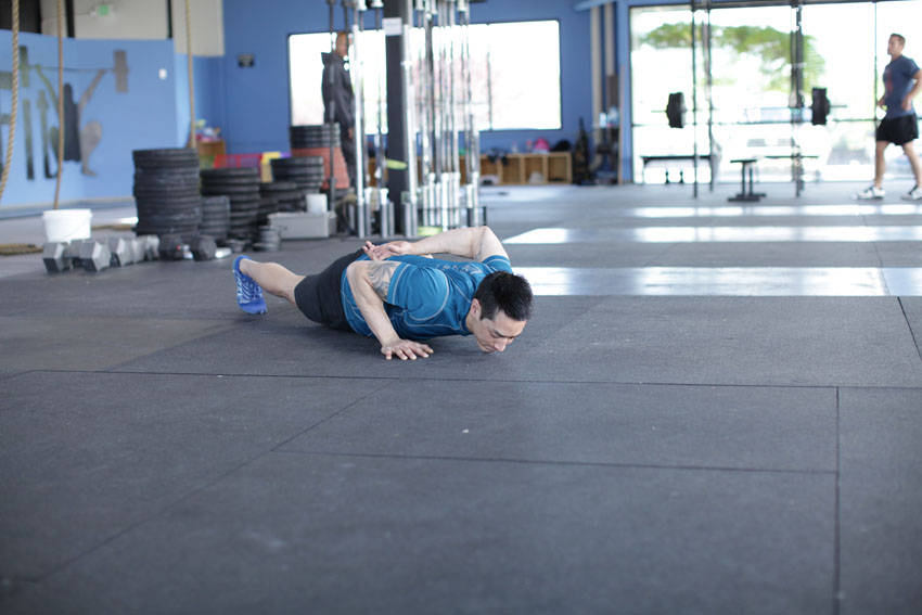 How to perform the Single-Arm Push-Up exercise
