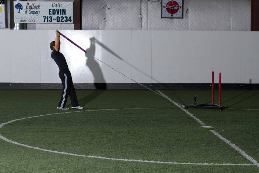 How to perform the Sled Overhead Backward Walk exercise