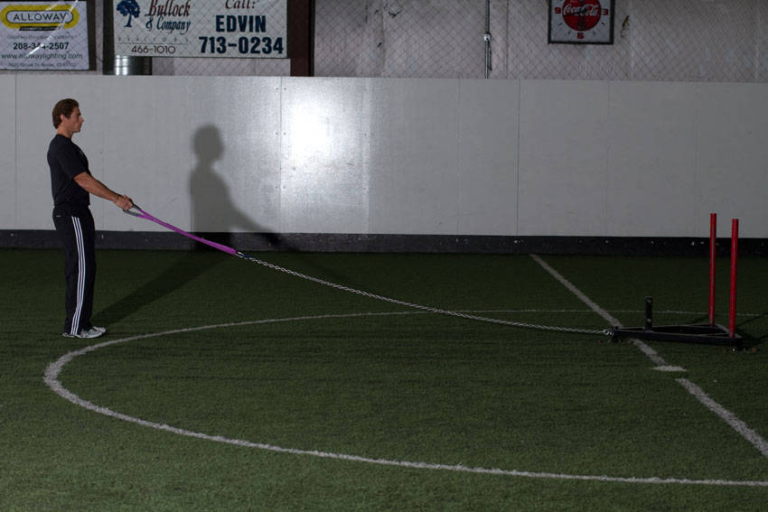 How to perform the Sled Reverse Flye exercise