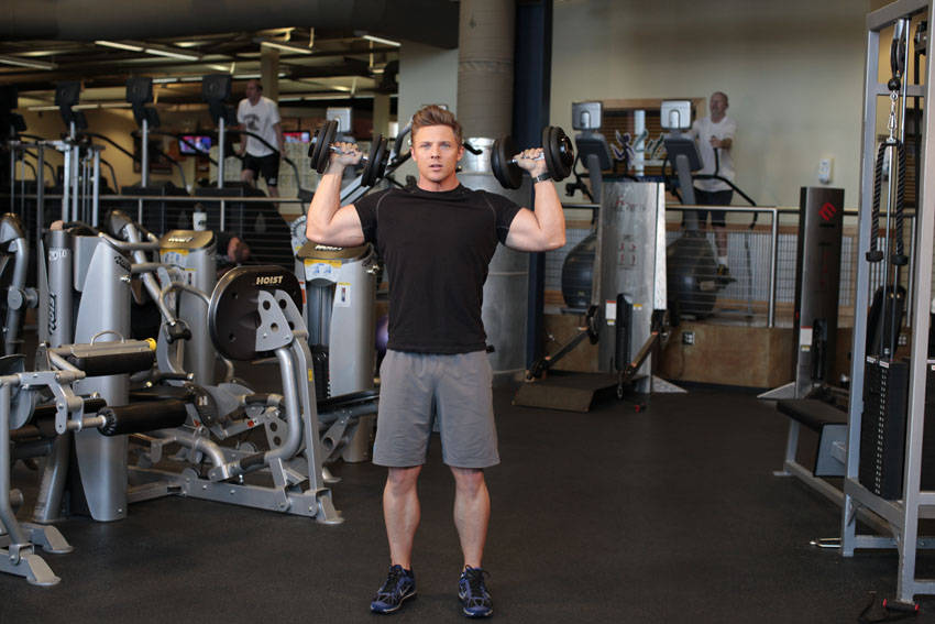 How to perform the Standing Alternating Dumbbell Press exercise