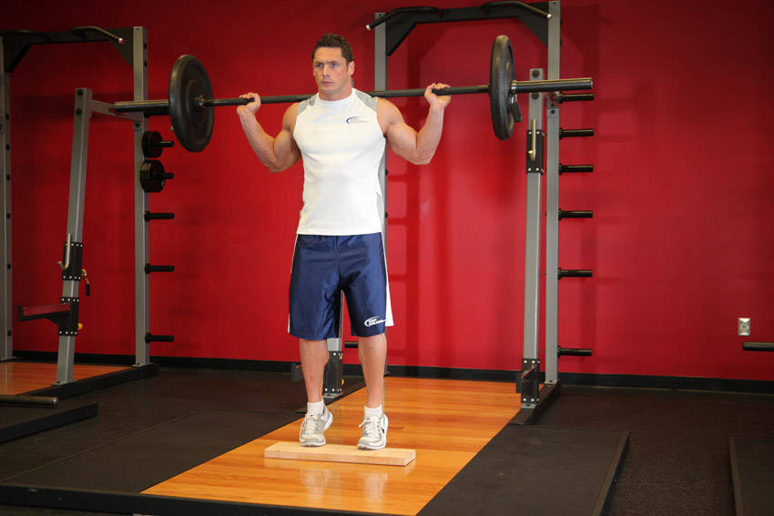 How to perform the Standing Barbell Calf Raise exercise