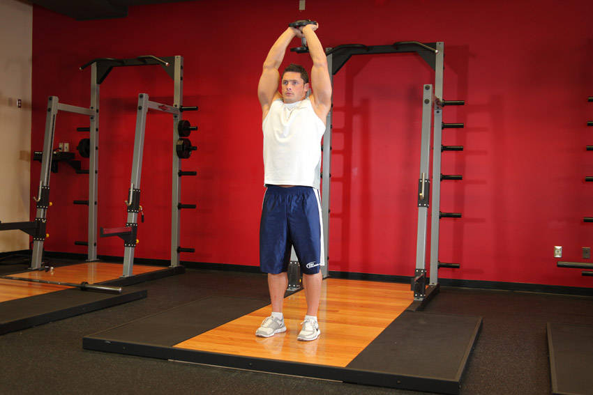 How to perform the Standing Dumbbell Triceps Extension exercise