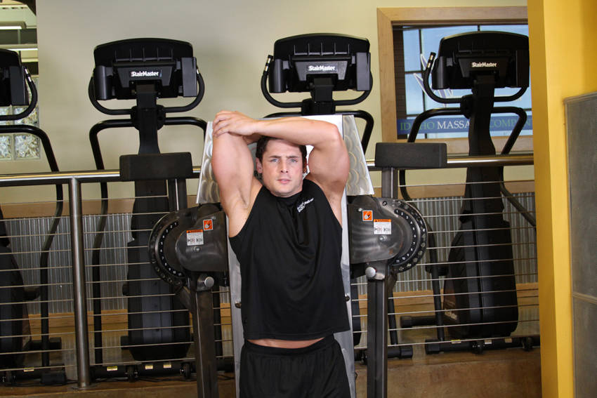 How to perform the Standing Low-Pulley One-Arm Triceps Extension exercise