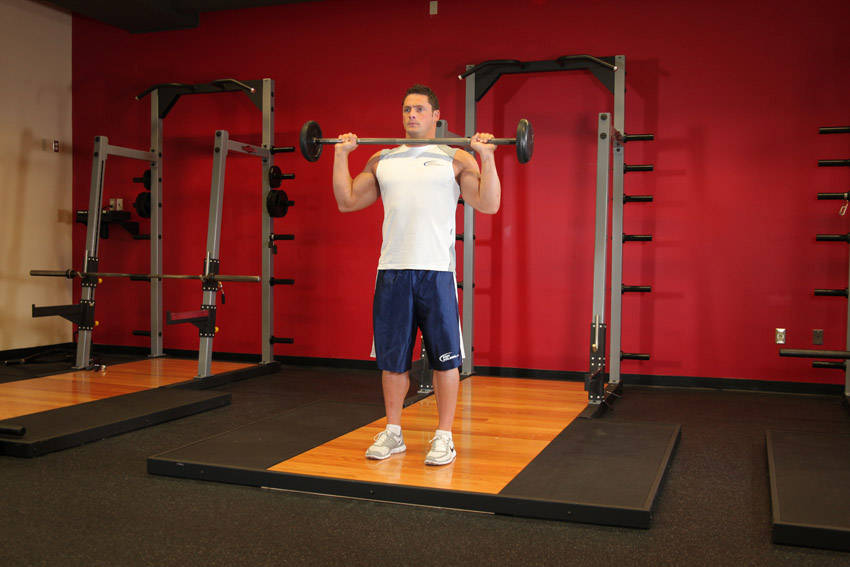 How to perform the Standing Military Press exercise