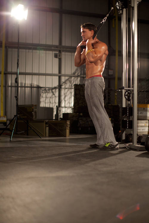 How to perform the Standing Rope Crunch exercise