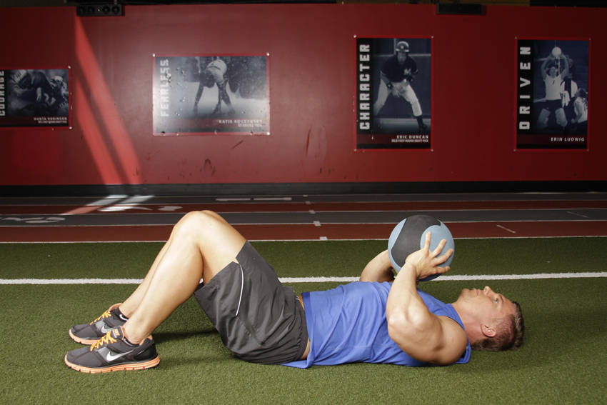 How to perform the Supine Chest Throw exercise