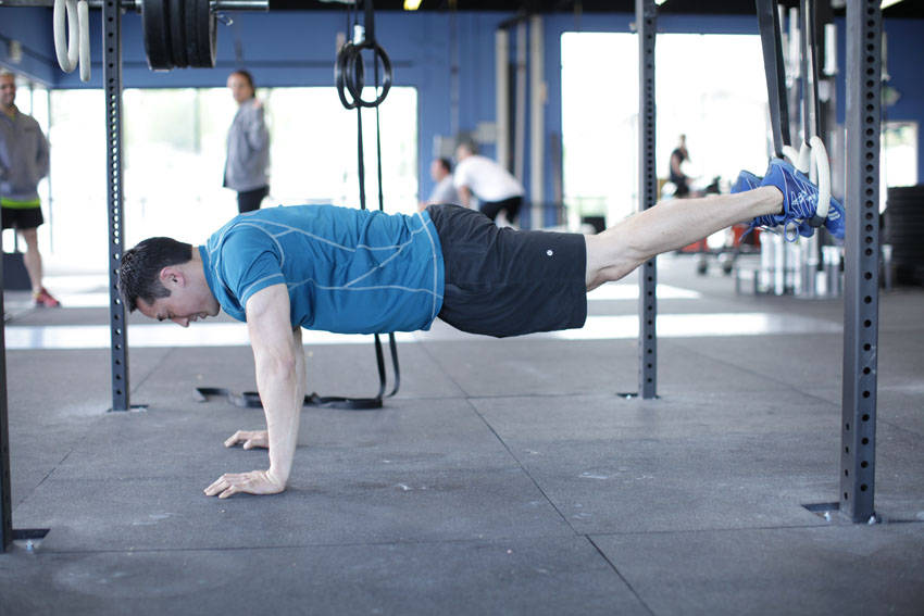 How to perform the Suspended Reverse Crunch exercise