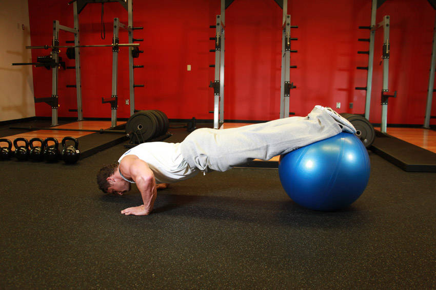 How to perform the Push-Ups With Feet On An Exercise Ball exercise