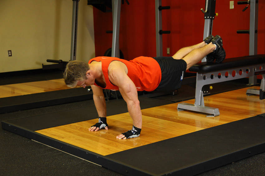 How to perform the Push-Ups With Feet Elevated exercise