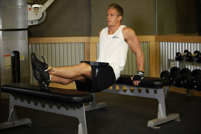 How to perform the Weighted Bench Dip exercise